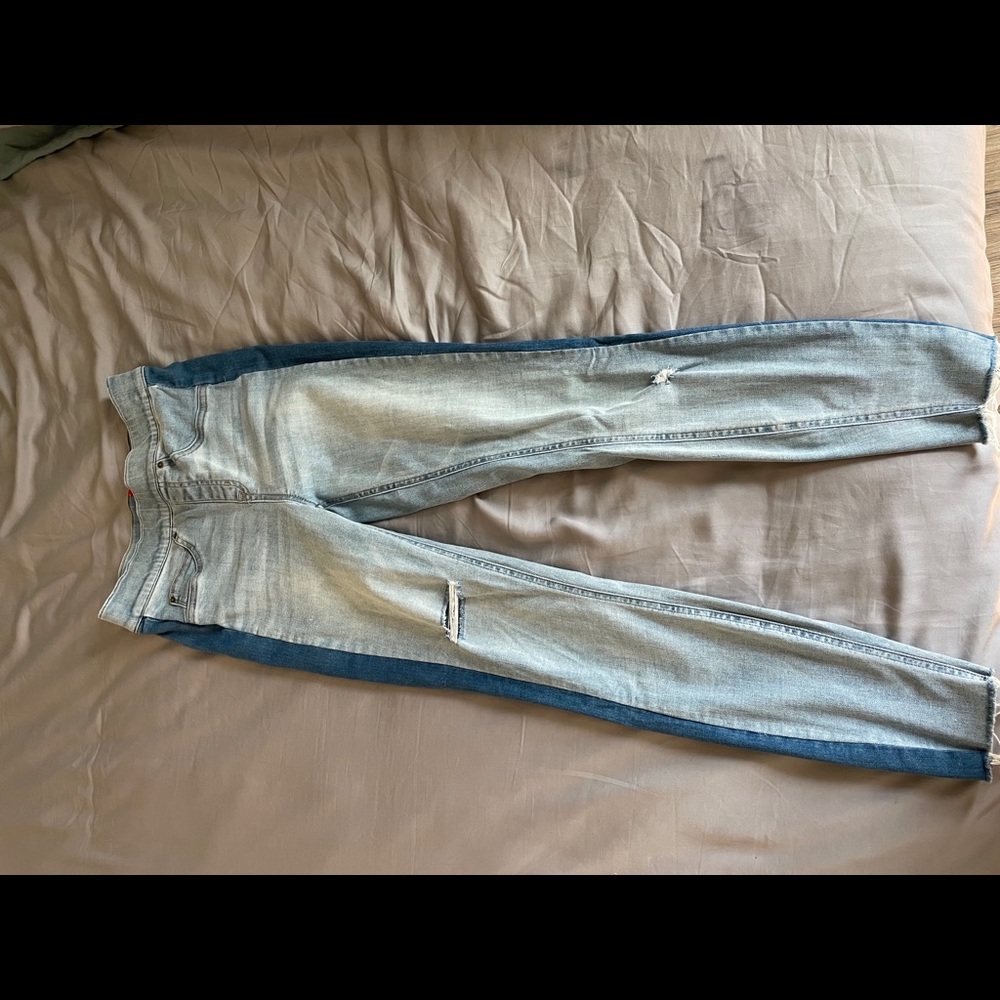 Spanx Jeggings with dark stripe on side.